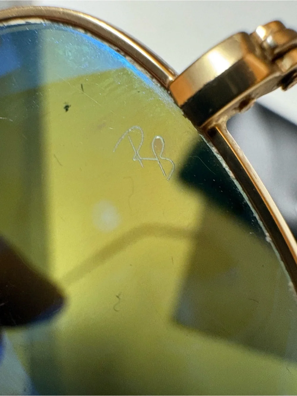 Ray-Ban Gold Frame Sunglasses with Blue Mirrored Lenses